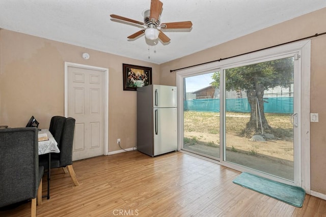 1030 Perrisito St, Perris, CA 92570 - office area featuring light wood-style floors, baseboards, and a ceiling fan