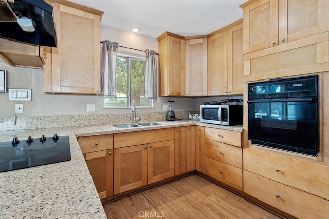 1030 Perrisito St, Perris, CA 92570 - kitchen featuring black appliances, a sink, light brown cabinetry, light wood-type flooring, and recessed lighting