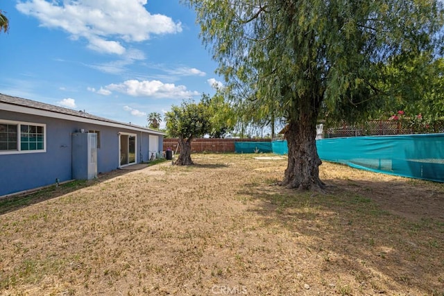 1030 Perrisito St, Perris, CA 92570 - view of yard with a swimming pool