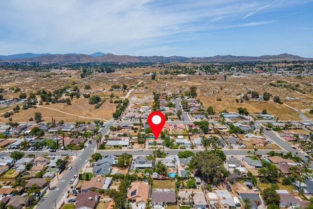1030 Perrisito St, Perris, CA 92570 - aerial overview of property's location with a mountainous background and nearby suburban area