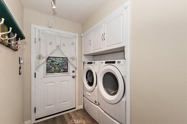 145 Cumberland Dr, Lake Arrowhead, CA 92352 - laundry area with washing machine and clothes dryer, dark wood-style floors, and cabinet space
