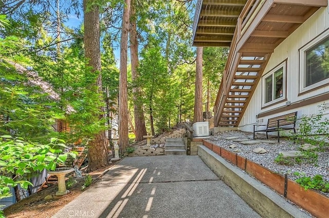 145 Cumberland Dr, Lake Arrowhead, CA 92352 - view of patio featuring stairway and central AC