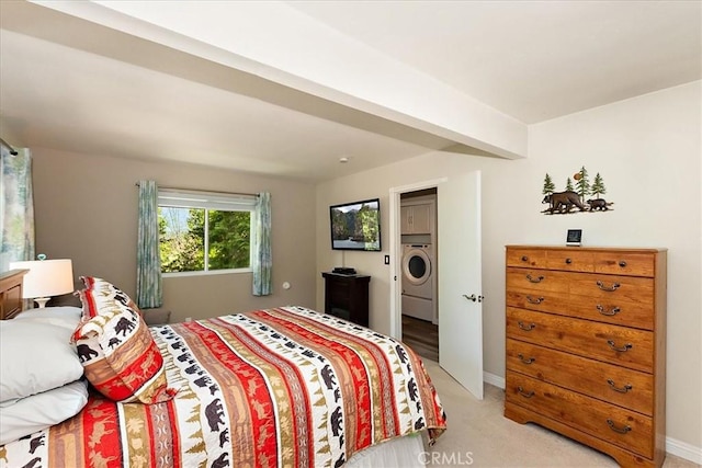 145 Cumberland Dr, Lake Arrowhead, CA 92352 - bedroom with washer / clothes dryer, light carpet, and baseboards