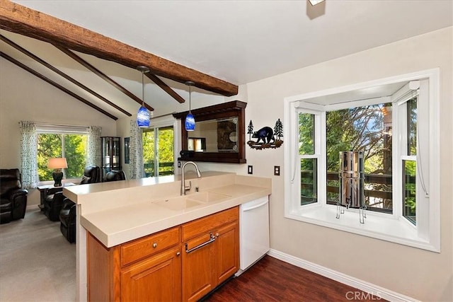 145 Cumberland Dr, Lake Arrowhead, CA 92352 - kitchen with dishwasher, a sink, open floor plan, baseboards, and a peninsula