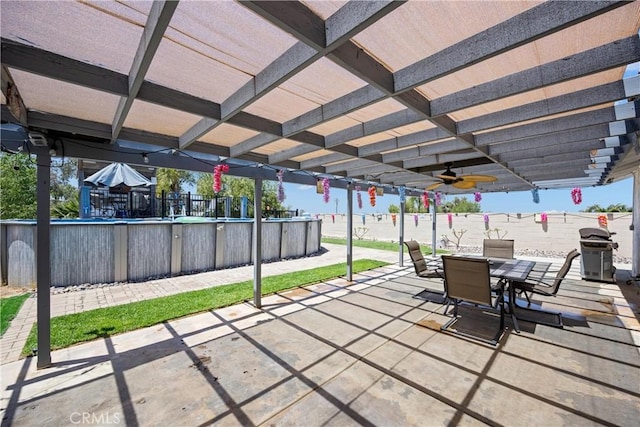 19927 Athenon Ave, Perris, CA 92570 - view of patio / terrace with outdoor dining area, grilling area, a water view, an outdoor pool, and a pergola