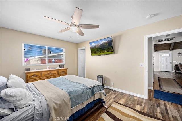 19927 Athenon Ave, Perris, CA 92570 - bedroom featuring wood finished floors, baseboards, and a ceiling fan