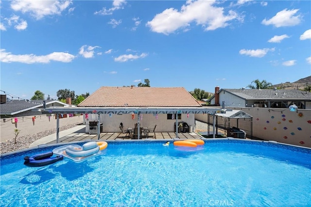 19927 Athenon Ave, Perris, CA 92570 - view of swimming pool with a fenced backyard and a patio