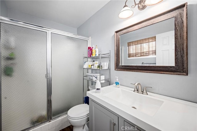 19927 Athenon Ave, Perris, CA 92570 - bathroom featuring toilet, vanity, and a stall shower