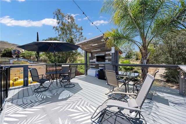 19927 Athenon Ave, Perris, CA 92570 - wooden deck with outdoor dining area