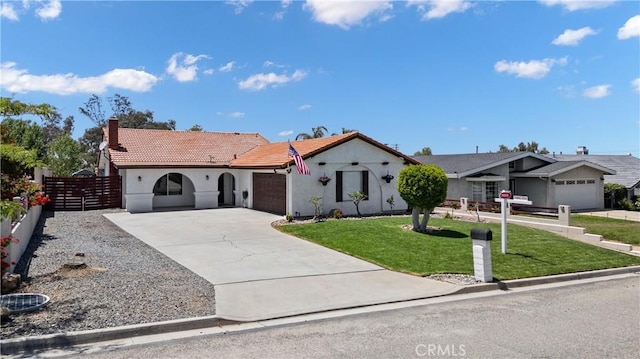 19927 Athenon Ave, Perris, CA 92570 - view of front of home featuring an attached garage, driveway, stucco siding, a chimney, and a tile roof