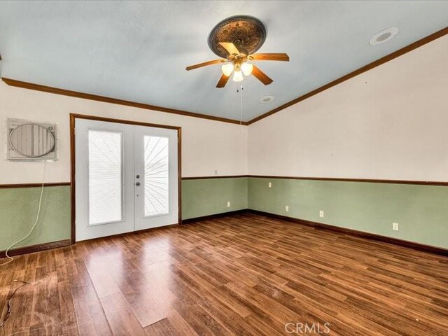 4689 Stirrup Ln Unit 29, Palms, CA 92277 - spare room featuring french doors, a ceiling fan, wood finished floors, crown molding, and baseboards