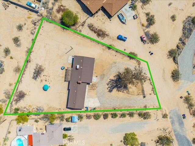 4689 Stirrup Ln Unit 29, Palms, CA 92277 - overview of rural landscape featuring a desert landscape and property parcel outlined