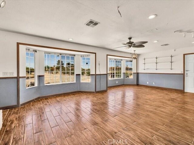 4689 Stirrup Ln Unit 29, Palms, CA 92277 - unfurnished room with ceiling fan, wood finished floors, baseboards, and recessed lighting
