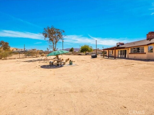 4689 Stirrup Ln Unit 29, Palms, CA 92277 - view of yard with fence