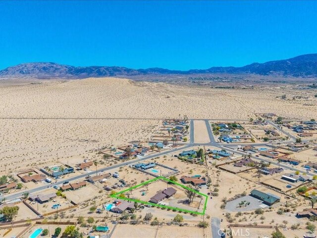4689 Stirrup Ln Unit 29, Palms, CA 92277 - overview of rural landscape featuring a mountain backdrop and a desert landscape