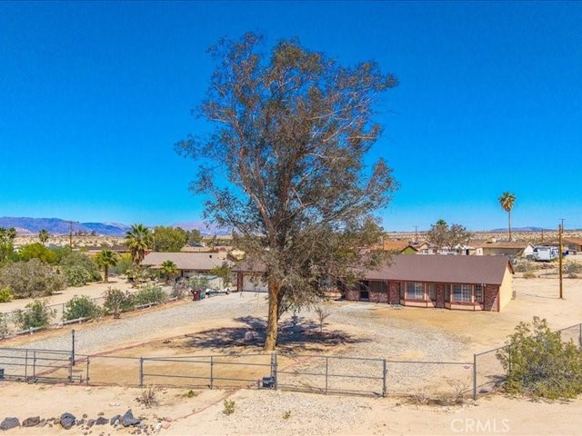 4689 Stirrup Ln Unit 29, Palms, CA 92277 - ranch-style home with a mountain view