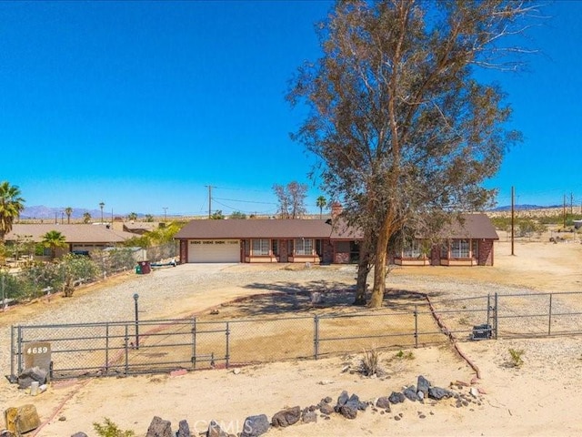 4689 Stirrup Ln Unit 29, Palms, CA 92277 - ranch-style house with driveway and a garage