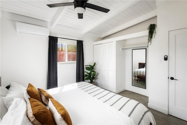 60515 Alta Loma Dr, Joshua Tree, CA 92252 - carpeted bedroom with a wall mounted air conditioner, ceiling fan, and baseboards