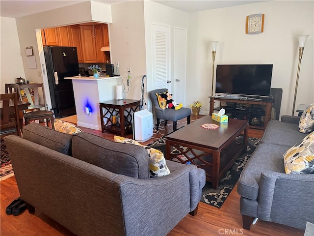 25779 Via Lomas Unit 170, Laguna Hills, CA 92653 - living room with light wood finished floors