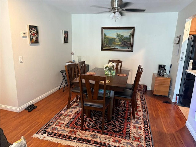 25779 Via Lomas Unit 170, Laguna Hills, CA 92653 - dining area featuring wood finished floors, baseboards, and ceiling fan