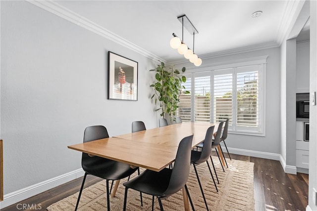 1421 Woodcrest Ave, Brea, CA 92821 - dining space featuring crown molding, baseboards, and dark wood-style floors