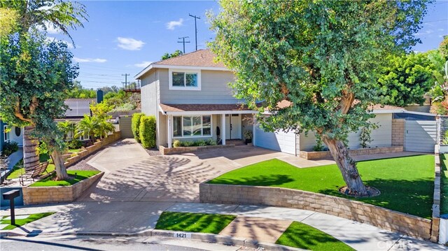 1421 Woodcrest Ave, Brea, CA 92821 - view of front of home with driveway and a shingled roof