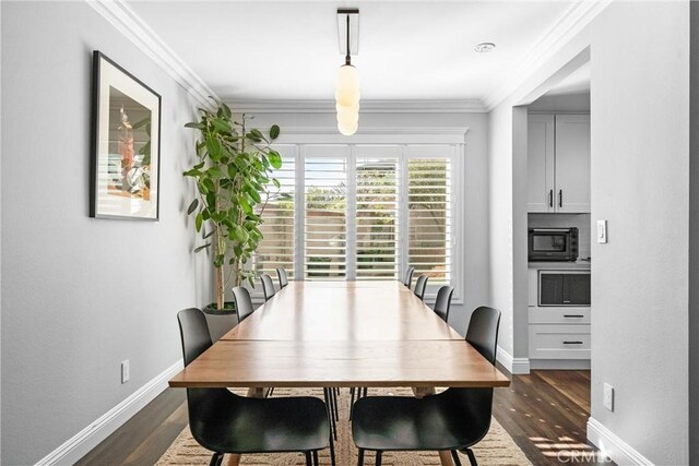 1421 Woodcrest Ave, Brea, CA 92821 - dining area with dark wood finished floors, baseboards, and crown molding