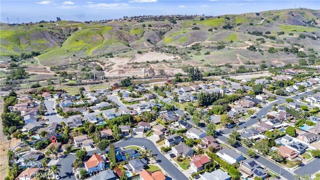 1421 Woodcrest Ave, Brea, CA 92821 - aerial overview of property's location featuring nearby suburban area