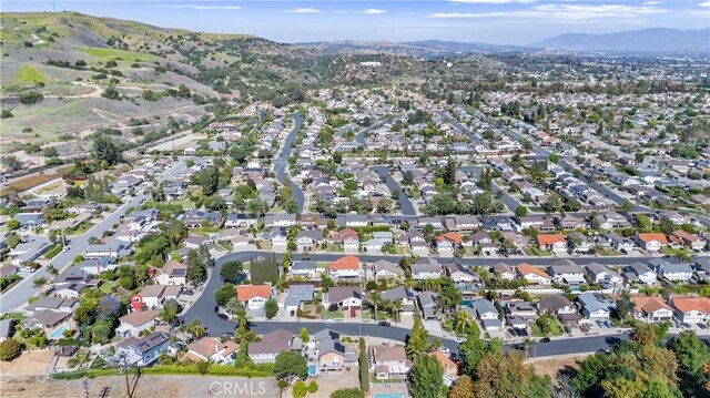 1421 Woodcrest Ave, Brea, CA 92821 - aerial overview of property's location with a mountain backdrop and nearby suburban area