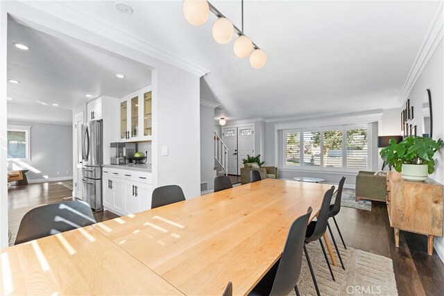 1421 Woodcrest Ave, Brea, CA 92821 - dining room with stairway, dark wood-type flooring, crown molding, and recessed lighting