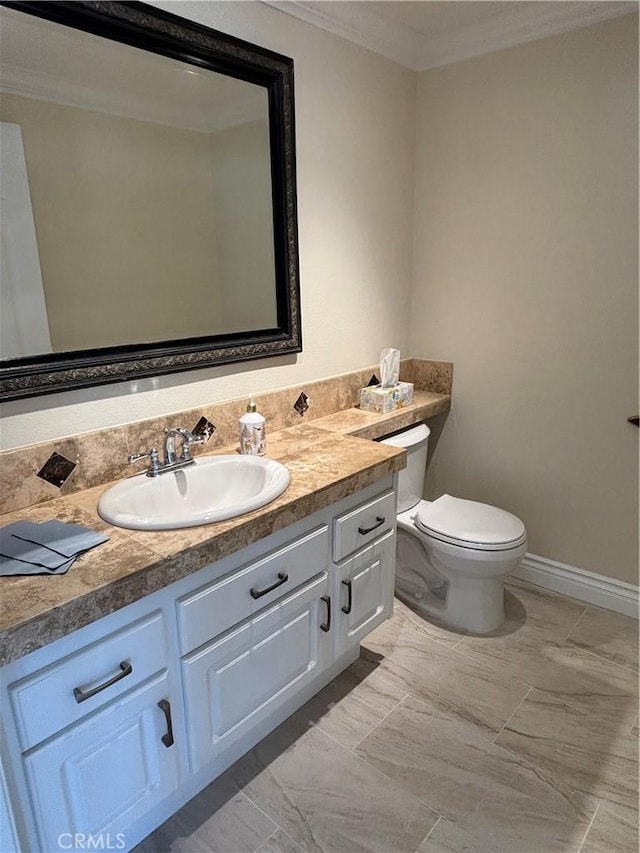 23342 Caminito Juanico Unit 304, Laguna Hills, CA 92653 - half bath with ornamental molding, vanity, and marble finish flooring
