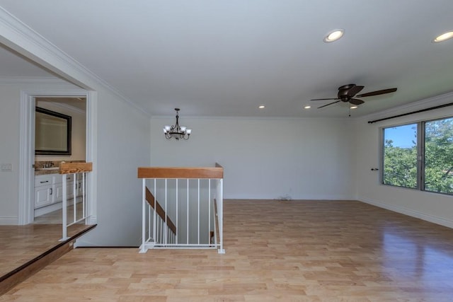 23342 Caminito Juanico Unit 304, Laguna Hills, CA 92653 - unfurnished room featuring light wood-style floors, crown molding, a chandelier, ceiling fan, and recessed lighting