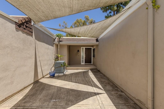 23342 Caminito Juanico Unit 304, Laguna Hills, CA 92653 - property entrance featuring a patio area and stucco siding