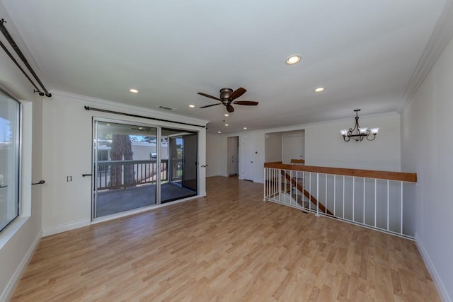 23342 Caminito Juanico Unit 304, Laguna Hills, CA 92653 - spare room with crown molding, light wood-style floors, a chandelier, recessed lighting, and a ceiling fan
