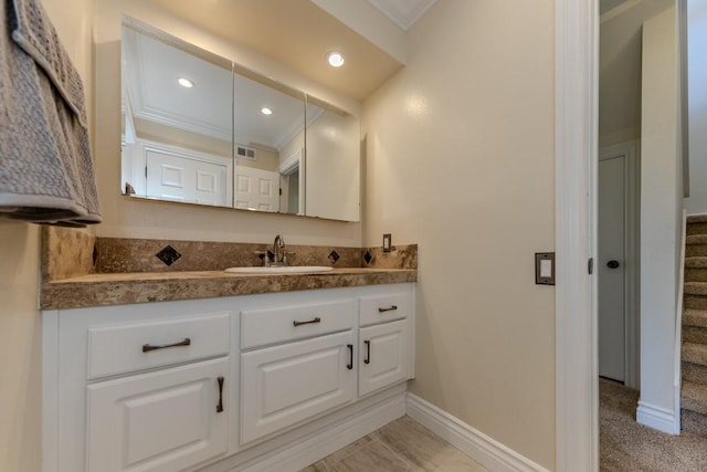 23342 Caminito Juanico Unit 304, Laguna Hills, CA 92653 - bathroom with ornamental molding, vanity, and recessed lighting