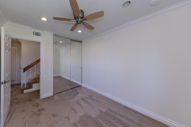23342 Caminito Juanico Unit 304, Laguna Hills, CA 92653 - unfurnished bedroom with ornamental molding, recessed lighting, carpet floors, a closet, and a ceiling fan