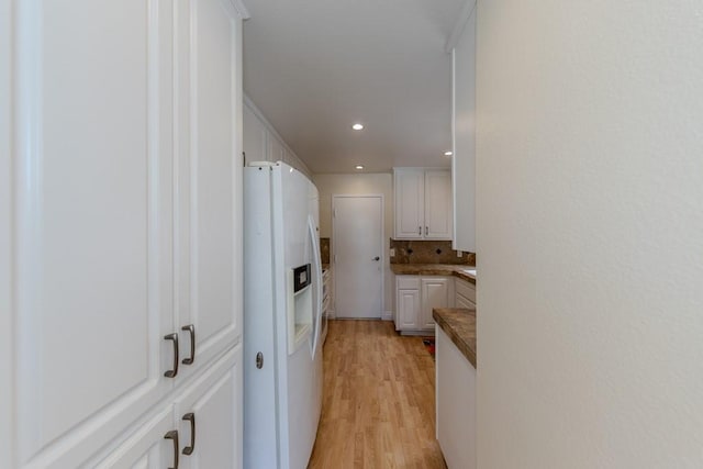 23342 Caminito Juanico Unit 304, Laguna Hills, CA 92653 - hallway with light wood finished floors and recessed lighting