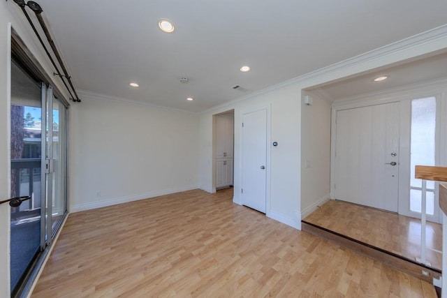 23342 Caminito Juanico Unit 304, Laguna Hills, CA 92653 - unfurnished room featuring light wood finished floors, crown molding, and recessed lighting