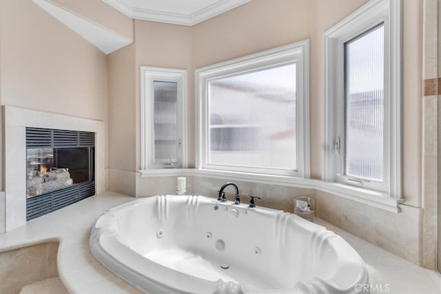 723 N Lucia Ave Unit A, Redondo Beach, CA 90277 - full bath with a whirlpool tub, plenty of natural light, a glass covered fireplace, and crown molding