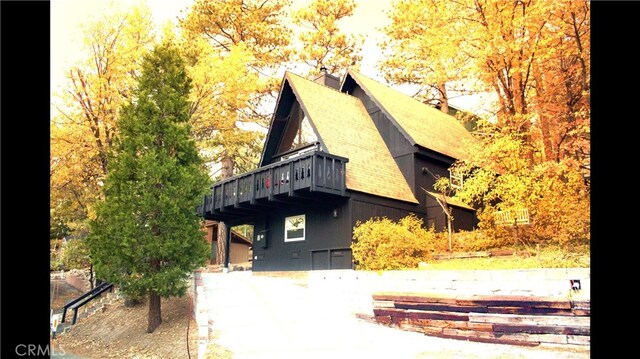 33020 Arrowbear, Running Springs, CA 92382 - view of home's exterior with a wooden deck and a chimney