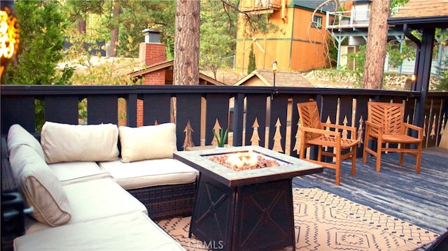 33020 Arrowbear, Running Springs, CA 92382 - wooden terrace featuring an outdoor living space with a fire pit