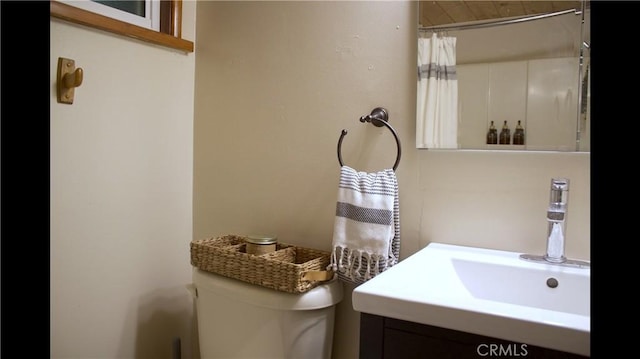 33020 Arrowbear, Running Springs, CA 92382 - full bathroom featuring vanity and toilet