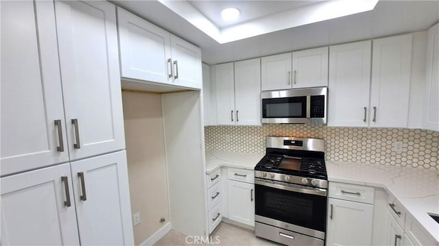 2473 Oswego St Unit 17, Pasadena, CA 91107 - kitchen with appliances with stainless steel finishes and white cabinets