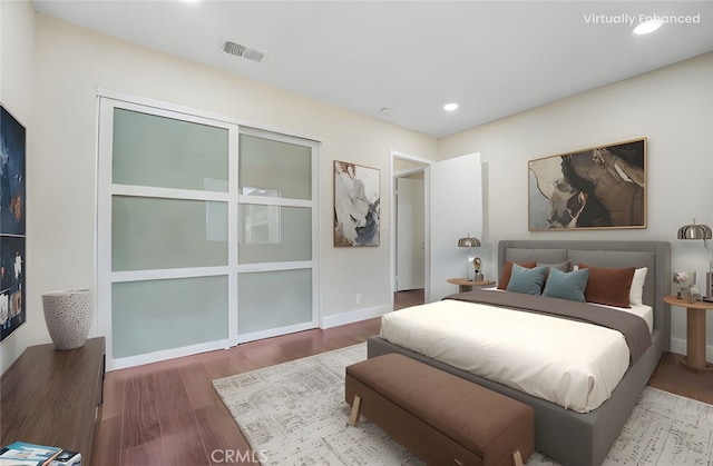 2473 Oswego St Unit 17, Pasadena, CA 91107 - bedroom with wood finished floors, recessed lighting, and baseboards