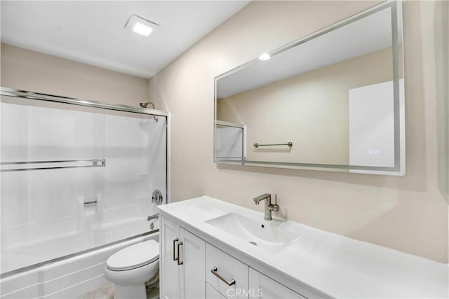 2473 Oswego St Unit 17, Pasadena, CA 91107 - bathroom with vanity, combined bath / shower with glass door, and toilet