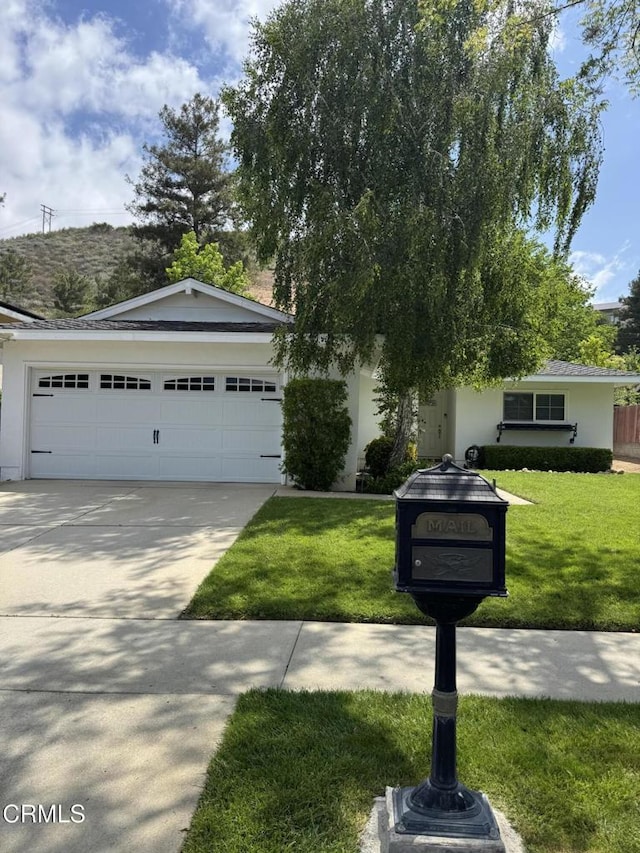 view of front of house with a front lawn