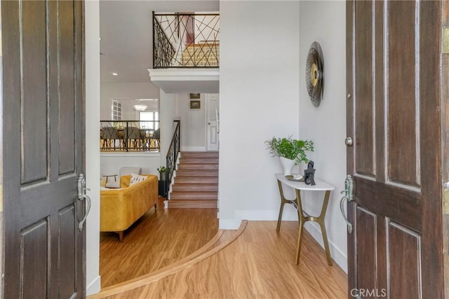 2311 Roscomare Rd Unit 16, Los Angeles, CA 90077 - entryway featuring wood finished floors and stairs
