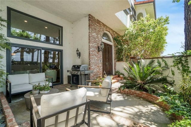 2311 Roscomare Rd Unit 16, Los Angeles, CA 90077 - view of patio with outdoor lounge area and area for grilling