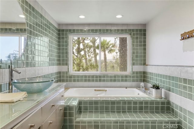 2311 Roscomare Rd Unit 16, Los Angeles, CA 90077 - full bath with a bath, vanity, tile walls, and recessed lighting