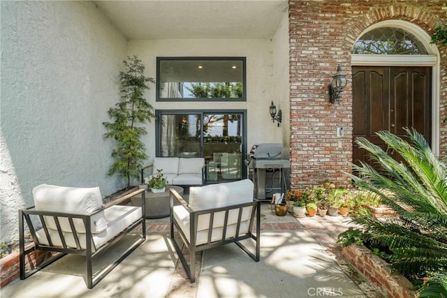 2311 Roscomare Rd Unit 16, Los Angeles, CA 90077 - view of patio with area for grilling and outdoor lounge area